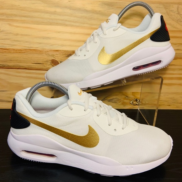 white and gold nikes